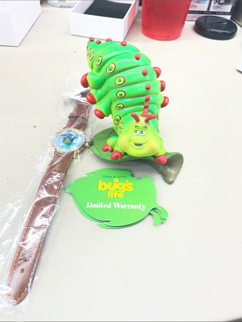 Vintage A Bug's Life Disney Heimlich watch and figurine set